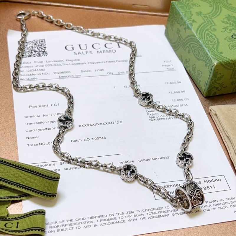 G*u*i necklaces